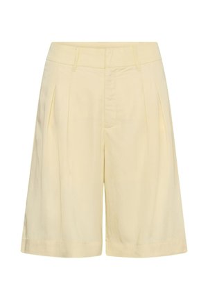 Pantaloni scurți cu talie înaltă, culoare crem, cu pliuri, buzunare pentru curea și închidere frontală ascunsă, expuși pe un fundal alb.