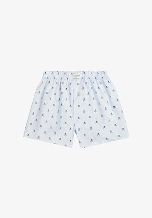 Bóxers de algodón azul claro con rayas blancas verticales, con un patrón de pequeñas calaveras negras. Cintura elástica con bragueta de un solo botón.