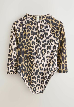 Body w panterkę z długimi rękawami, zapinany z tyłu na zamek. Wykonany z gładkiego, elastycznego materiału z kontrastującym wzorem.