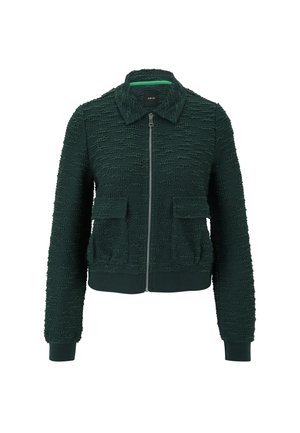 Veste bomber vert foncé en tissu texturé, avec zip avant, deux poches plaquées, poignets en côtes et ourlet. Comprend un col et une étiquette de marque à l'intérieur.
