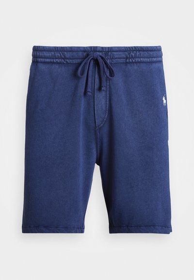 Shorts bleu marine en tissu doux, dotés d'une taille élastique avec cordon de serrage, et d'un petit logo sur le côté gauche à l'avant.