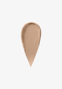 Beiger flüssiger Foundation-Make-up-Farbfleck mit glatter, abgerundeter Oberseite und spitz zulaufendem Boden auf weißem Hintergrund.