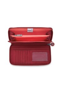 Kipling röd plånbok med slät tyg, dragkedjestängning, flera kreditkortsfack, ett transparent ID-fack och ett litet myntfack.
