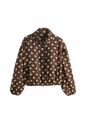 Braune Cropped-Jacke mit weißen Polka-Dots, hohem Kragen, langen Ärmeln, Knopfverschluss und elastischen Bündchen und Saum.