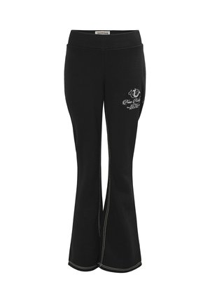 Schwarze Schlaghose mit weißer Kontrastnaht und kleinem weißem True Religion-Logo auf dem oberen vorderen Oberschenkel.