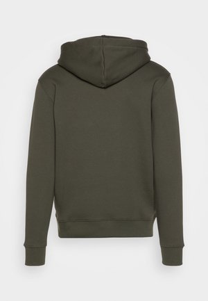 Hoodie in Olivgrün, aus weichem Baumwoll-Mix. Verfügt über eine Kängurutasche und gerippte Bündchen. Glatte Textur, einfaches Design.