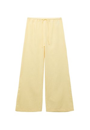 Jasnożółte, szerokie spodnie z elastycznym pasem i sznurkiem. Wykonane z lekkiej, teksturowanej tkaniny.