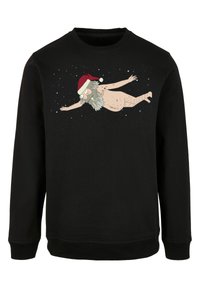 Svart sweatshirt med en tecknad karaktär som har skägg och tomteluva, avbildad mot en stjärnfull rymdbakgrund.