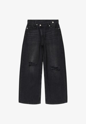 Zwarte jeans met wijde pijpen, versleten scheuren op beide knieën, knoop- en ritssluiting aan de voorkant, en ontwerp met vijf zakken.