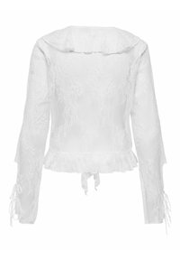 Blouse blanche en dentelle à manches longues avec ourlet et poignets volantés, détail de lien dans le dos et délicat motif de broderie florale.