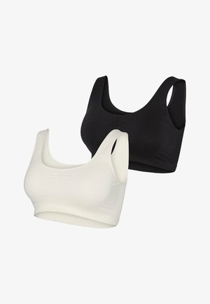 Two seamless crop bras in black and white. Made of stretchy fabric, featuring wide straps and a rounded neckline for comfortable wear.