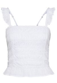 Witte camisole met gerimpelde bandjes, textuur smocking en een peplumzoom. Heeft subtiele horizontale stiksels en een zachte stof.