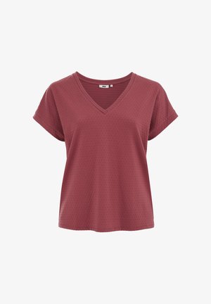 Chemisier femme à manches courtes, texturé couleur vieux rose poussiéreux, col en V, coupe décontractée et manches retroussées sur fond blanc.