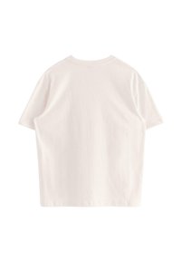 T-shirt a maniche corte, con collo a giro in cotone rosa chiaro. Caratterizzato da una vestibilità ampia e orlo standard senza loghi o motivi visibili.