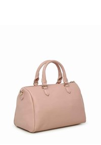Lys pink læder håndtaske med rundet form, dobbelte top-håndtag og hardware i guld-tone. Har en lynlåslukning og minimale syninger.