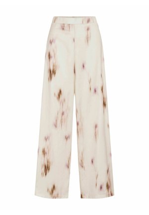Pantalon crème à jambes larges avec motifs tie-dye marron et violet et taille élastique, présenté sur un fond blanc uni.