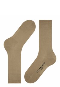 Beige cotton socks with ribbed cuff, smooth texture, reinforced heel and toe, and printed brand logo on the sole.