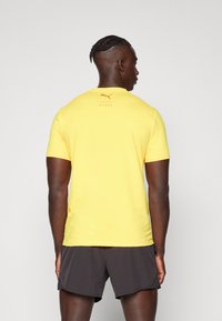 Puma HYROX ALWAYS ON CLOUDSPUN TEE - Tekninen t-paita - sun stream