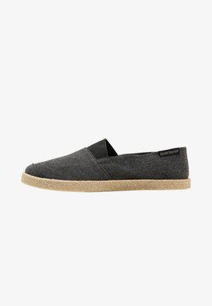Gray canvas slip-on shoe with a jute rope sole, featuring elastic side accents and a logo tag on the heel. Smooth texture. Flat design.