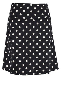 Falda negra con lunares blancos, con un corte recto, fabricada en un tejido suave y con una cinturilla elástica para mayor comodidad.