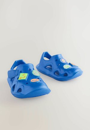 Next Pool slides - blue happy face