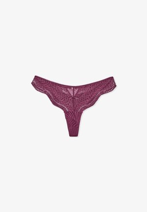 Lace thong in dark burgundy featuring a floral pattern, scalloped edges, and a minimal back for a delicate appearance.