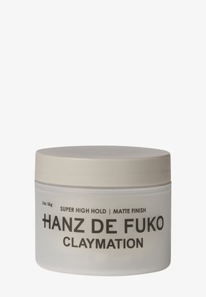 Behälter des Hanz de Fuko Claymation Haarprodukts mit super starkem Halt und mattem Finish, 2 Unzen, beiger Deckel, weißes Gefäß.