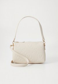 Cream faux leather handbag with embossed floral and logo patterns, a zip closure, and an adjustable shoulder strap. Gold hardware accents.