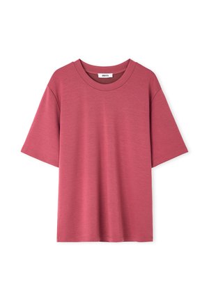 Kurzärmeliges T-Shirt mit Rundhalsausschnitt in gedämpftem Rosaton und lockerer Passform, vor weißem Hintergrund dargestellt.