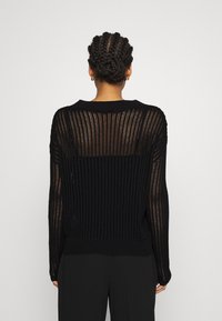 RIANI Stickad tröja - black