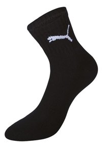 Calcetín negro de algodón con textura acanalada, de longitud a medio pantorrilla, que presenta el logo blanco de Puma en el lado.