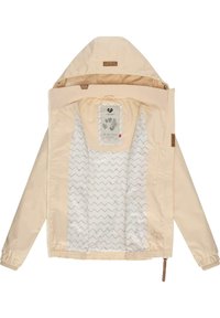 Beige jacket with a hood, elastic cuffs, lined interior displaying zigzag pattern, and a drawstring at the hem. Features outer label tag.