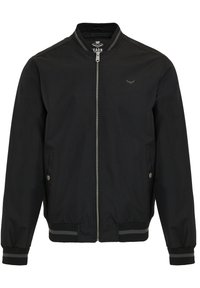 Veste bomber noire en tissu tissé, dotée d'une fermeture éclair à l'avant, de poignets et d'un col côtelés, et de deux poches latérales avec fermetures à pression.