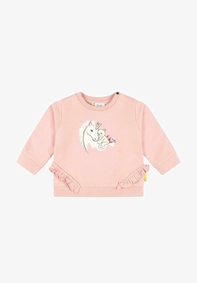 T-shirt bébé à manches longues rose avec des détails à volants et un imprimé sur le devant représentant une licorne, un ours en peluche et un oiseau portant des chapeaux de fête.