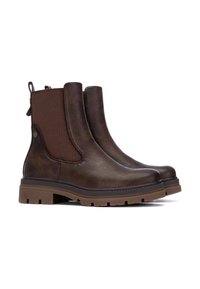 Botas de cuero marrón hasta el tobillo con paneles laterales elásticos, acabado texturizado y suelas de goma con un patrón de relieve para mayor agarre. Detalle en forma de asa en la parte trasera.