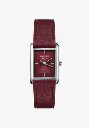 Rosefield rechthoekig horloge met een bordeauxleren band, gestructureerde wijzerplaat, zilveren hardware en minimalistische uurmarkeringen.