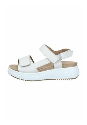White leather open-toe sandal with adjustable straps, cushioned beige footbed, and thick white rubber sole with textured grip.