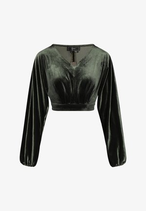 Velvet crop top in dark green with a V-neck, pleated front, and long balloon sleeves gathered at the cuffs.