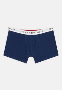 Μπλε ναυτικό boxer briefs από απαλό βαμβάκι, με λευκή μέση που φέρει το λογότυπο "TOMMY HILFIGER" και κόκκινο και λευκό διακοσμητικό στοιχείο.