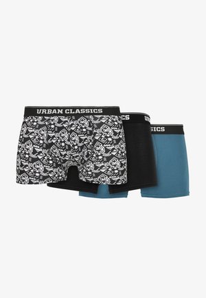 Boxer shorts set featuring three pairs: one with a black and white geometric pattern, one solid black, and one teal. Cotton blend with elastic waistband.