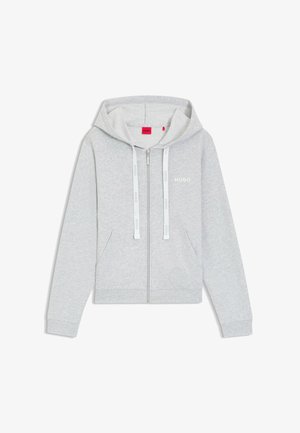 Lichtgrijze hoodie met rits, koordjes en een buidelzak. Voorzien van subtiele branding op de borst en gemaakt van een zachte, getextureerde stof.