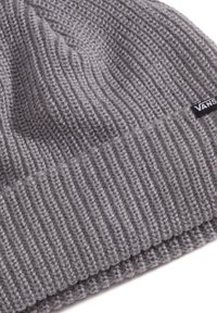 Gray knitted Vans beanie with ribbed texture and folded cuff, featuring a small black Vans logo tag on the side.