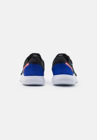 Nike Performance FLEX EXPERIENCE RUN 12 - Tenisice za cestovno trčanje - black/green frost/white/concord/hot punch