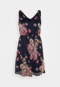 Blommig klänning i marinblått tyg med V-ringning, ärmlös design, åtstramad midja och stora rosa- och vita blommönster.