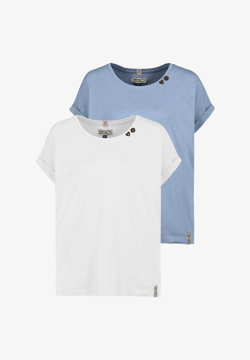 Two short-sleeve t-shirts: one white with three heart-shaped buttons near the collar, and one light blue with rolled sleeves, both made of soft fabric.