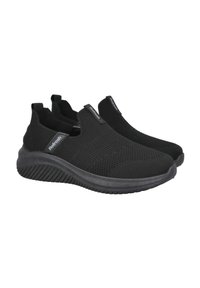 Zapatos negros sin cordones con parte superior de malla transpirable, patrones texturizados, lados elásticos y una suela de goma acolchada con un diseño estriado.