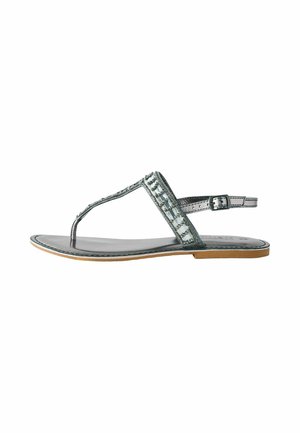 Flat metallic silver thong sandal with beaded strap detail and adjustable ankle buckle, beige sole, displayed on white background.