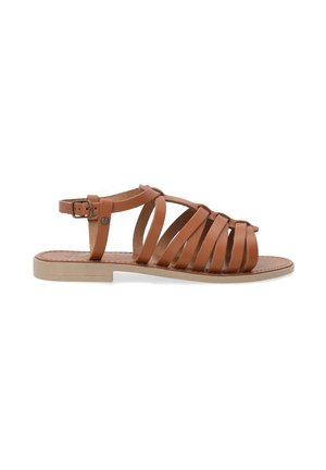 Brown leather sandal with multiple strap design, open toe, and back ankle strap. Flat sole in a light tan color, simple and functional.