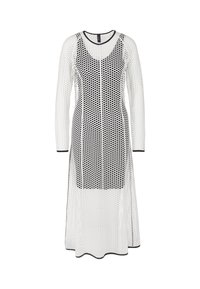 Langes, offenes Kleid aus weißem Netz mit schwarzen Punkten. Hat lange Ärmel und einen runden Halsausschnitt, mit schwarzem Besatz an den Kanten.