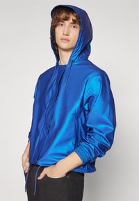 Rains STRING JACKET UNISEX - Vasaras jaka - storm